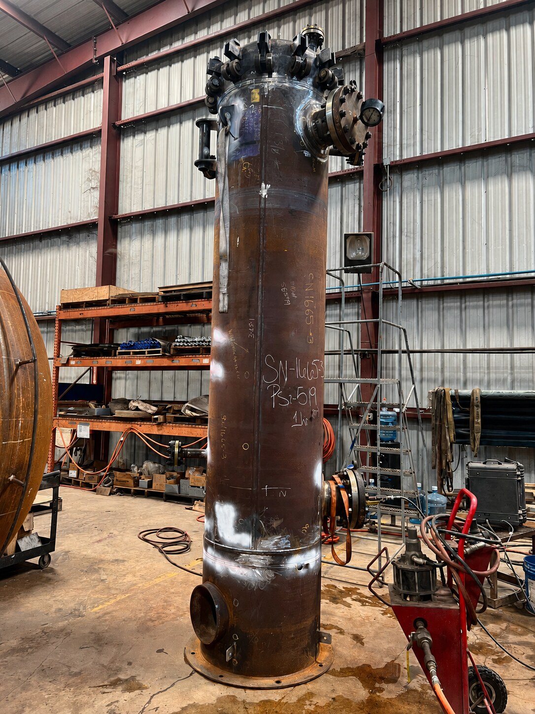 Pressure vessel connected to hydrotesting equipment inside the HPD shop